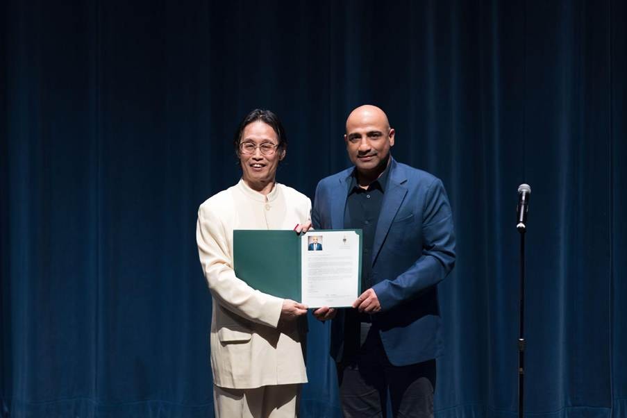 YCMA students and academy representatives at a community recognition event